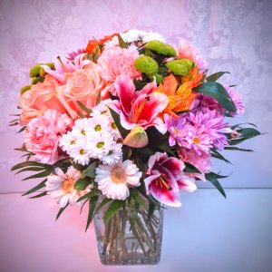 Ramo de flores variadas grande a elección de la florista, tonos rosados